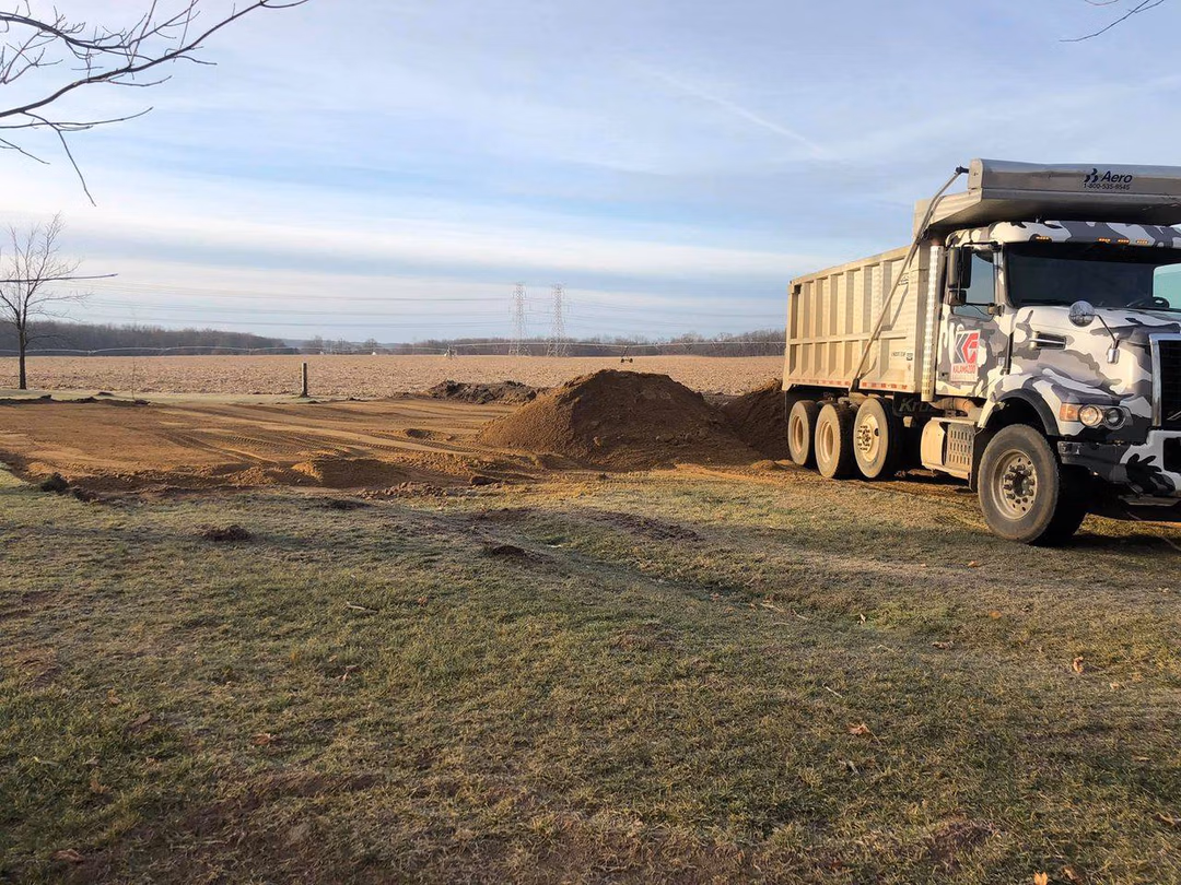 Kalamazoo Excavation dump truck on newsly cleared residential site.